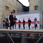 فرقة الهدف للدبكة  الشعبية و فرقة كنعان للتراث والفنون الشعبية في سوق الحرجة رام الله