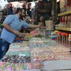 بالصور تجهيزات وأجواء العيد بمدينة نابلس اليوم