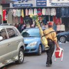 بالصور تجهيزات وأجواء العيد بمدينة نابلس اليوم