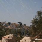 بلعين في مسيراتها  والاحتلال بقمعه