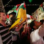 مواطنون يتابعون خطاب الرئيس وسط مدينة رام الله