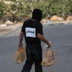 بالصور : مطاعم رام الله تتبرع بوجبات طعام للمتظاهرين والمسعفين والصحفيين قرب مدخل البيرة الشمالي