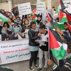 اطفال يطالبون الامم المتحدة توفير حماية دولية للشعب الفلسطيني
