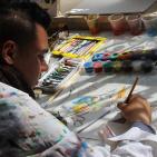 الفتى سلطان يصالح ذاته والمجتمع في رسوماته