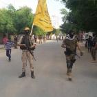 كتائب شهداء الأقصى تنظم عرض عسكري غرب غزة