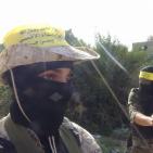 كتائب شهداء الأقصى تنظم عرض عسكري غرب غزة