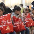 المشروبات الوطنية كوكاكولا/ كابي وراية اف ام  يعيدان على أيتام الجمعية الخيرية الاسلامية بالخليل