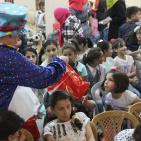 المشروبات الوطنية كوكاكولا/ كابي وراية اف ام  يعيدان على أيتام الجمعية الخيرية الاسلامية بالخليل