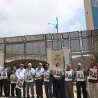 وقفة تضامنية مع الاسير الصحفي عمر نزال وبلال كايد امام مقر الامم المتحدة في رام الله