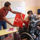 مع بداية العام الدراسي الجديد.. شركة المشروبات الوطنية كوكاكولا/كابي وشركة راية توزعان الهدايا على طلاب جمعية الياسمين