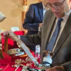 بالصور| السفير الرويضي يزور مهرجان ليالي مسقط ويُشيد بالجناح الفلسطيني