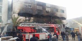 الاحتلال يحرق محل العجولي لصرافة بعد مصادرة امواله