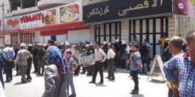 الأجهزة الامنية تعتدي على وقفة تضامنية مع الأسرى