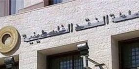 "النقد": نتابع مع كافة الأطراف لإدخال عملة الدولار إلى غزة