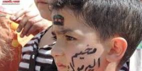 وقفة تضامنية في الخليل مع مخيم اليرموك