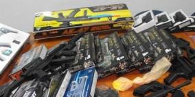 اتلاف كميات قمح منفوش للأطفال وضبط 2600 مسدس خرز في الخليل