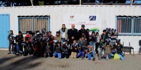 عطاء فلسطين توزع كنزات شتوية للعام الثالث عشر على التوالي بدعم من بنك الأردن