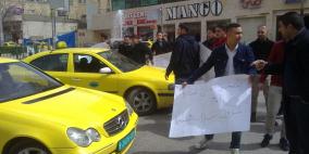 بالصور، احتجاجات على تغيير مسار الخطوط الداخلية وسط الخليل