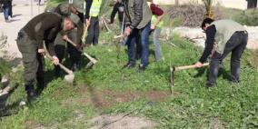 الأمن الوطني وبلدية جنين يزرعون الأشتال في يوم الشجرة
