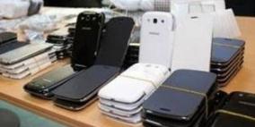 الشرطة تكشف ملابسات سرقة 80 هاتفا محمولا في الخليل