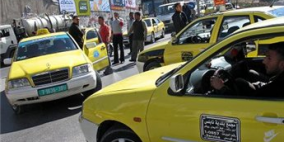 تظاهرة للمطالبة بفتح الشارع الذي يربط مدينة الخليل بمحيطها