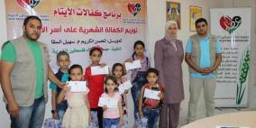 جمعية عطاء فلسطين الخيرية توزع الكفالة الشاملة للأيتام