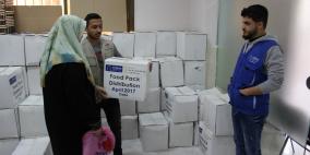 جمعية عطاء فلسطين الخيرية توزع طرود غذائية شهرية على الأيتام والأسر الفقيرة