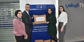 موظفو البنك الوطني يطلقون مبادرة "لنشاركهم الدفء" للتبرع للأسر المعوزة