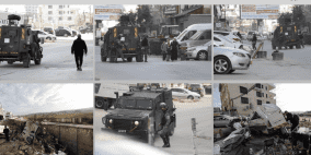 الاحتلال يخطر بهدم محال تجارية في محيط مخيم قلنديا