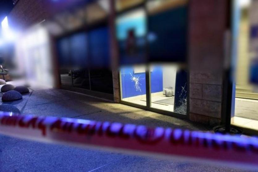 اطلاق النار على البنك