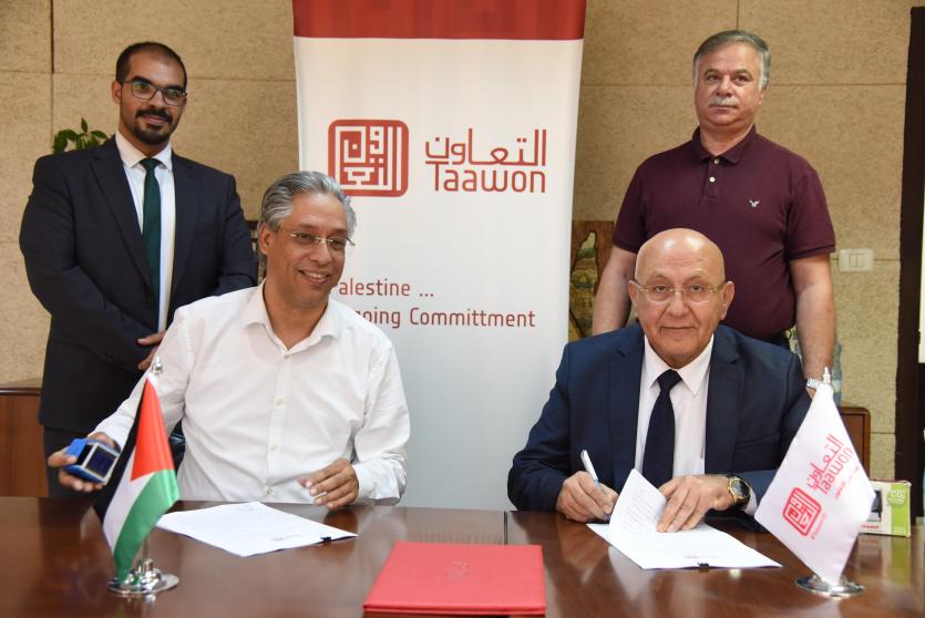 جانب من توقيع الاتفاقية